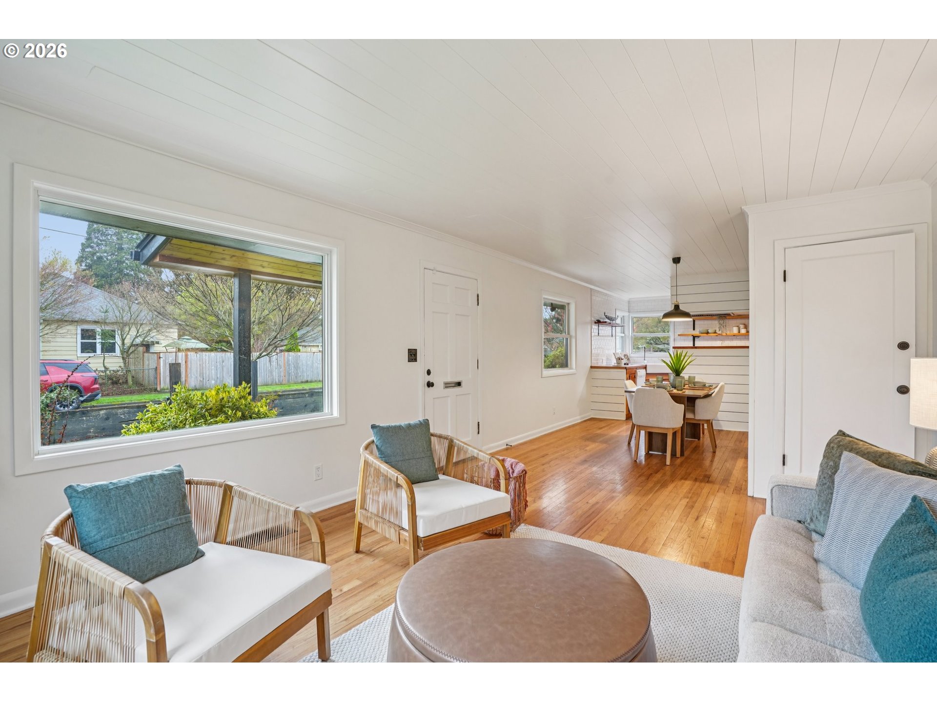7921 Northeast Clackamas Street Portland, OR 97213 - Photo 6 of 31 a living room with furniture and a large window