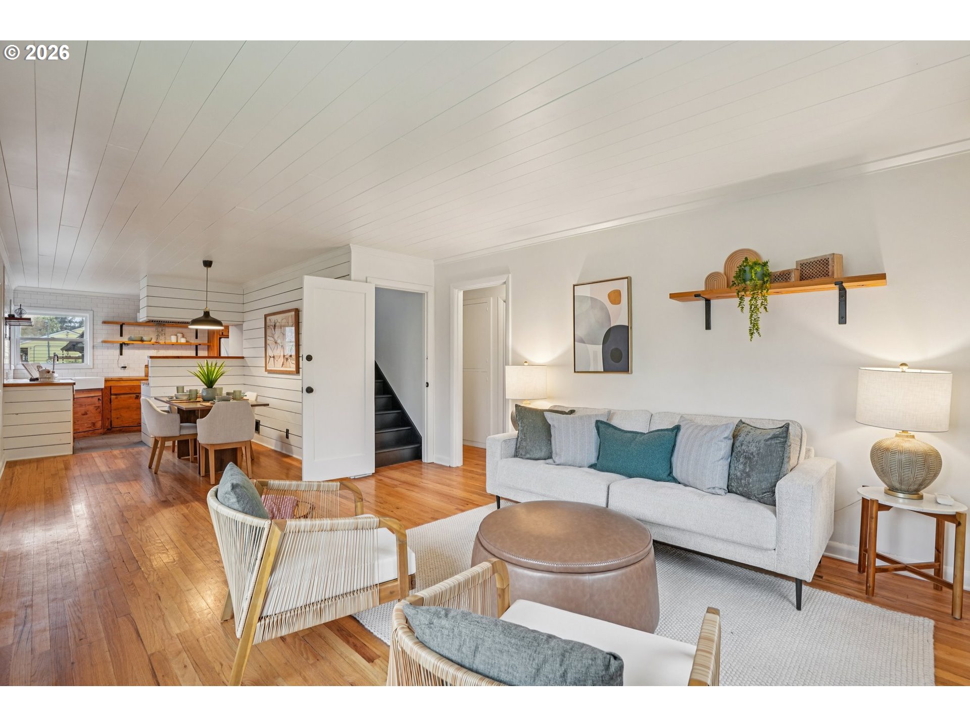 7921 Northeast Clackamas Street Portland, OR 97213 - Photo 7 of 31 a living room with furniture and a wooden floor