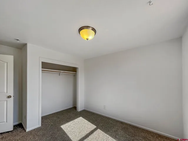 a view of a small space with a wooden floor