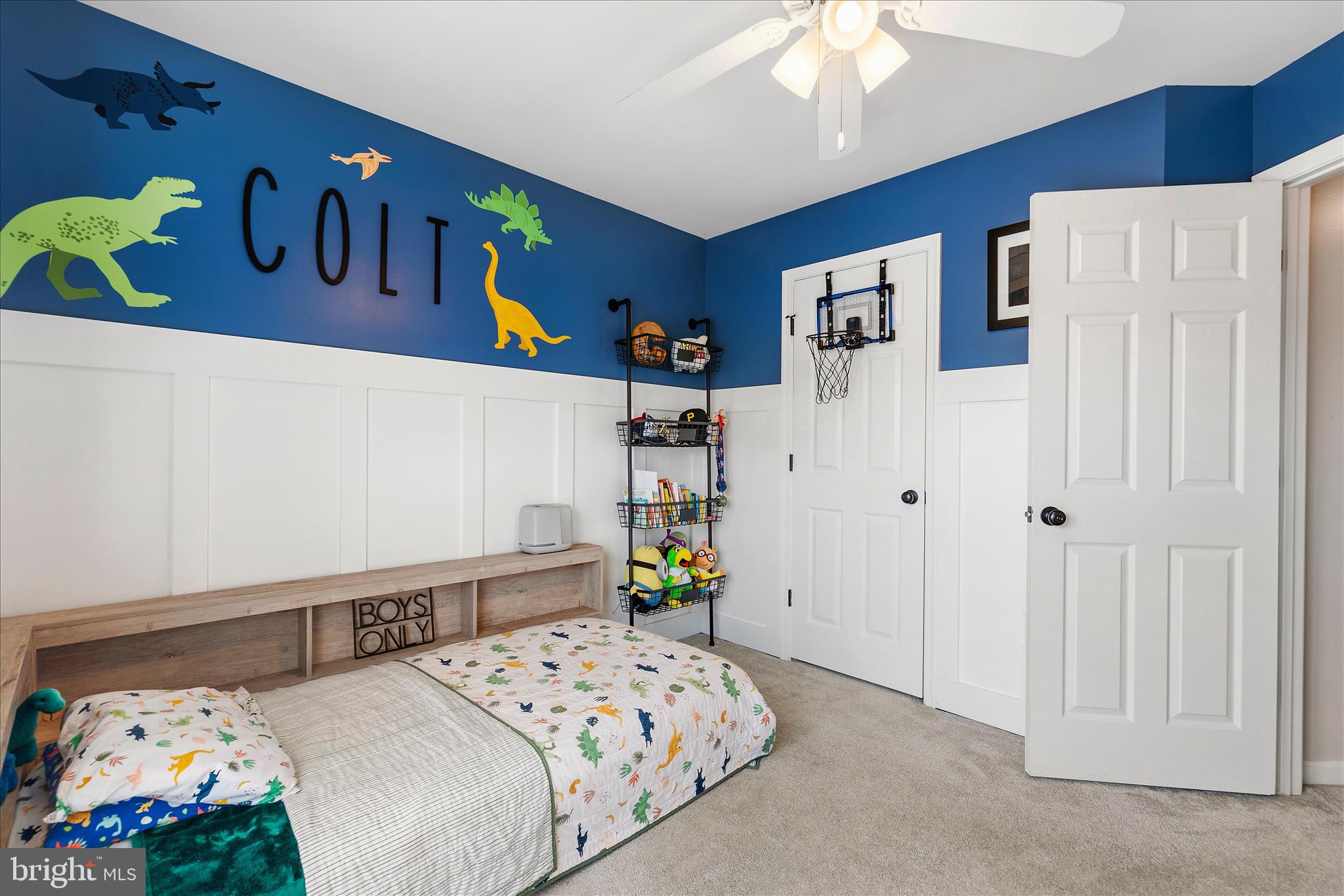 4840 Marsden Place Frederick, MD 21703 - Photo 21 of 46 a bedroom with a bed and a chandelier