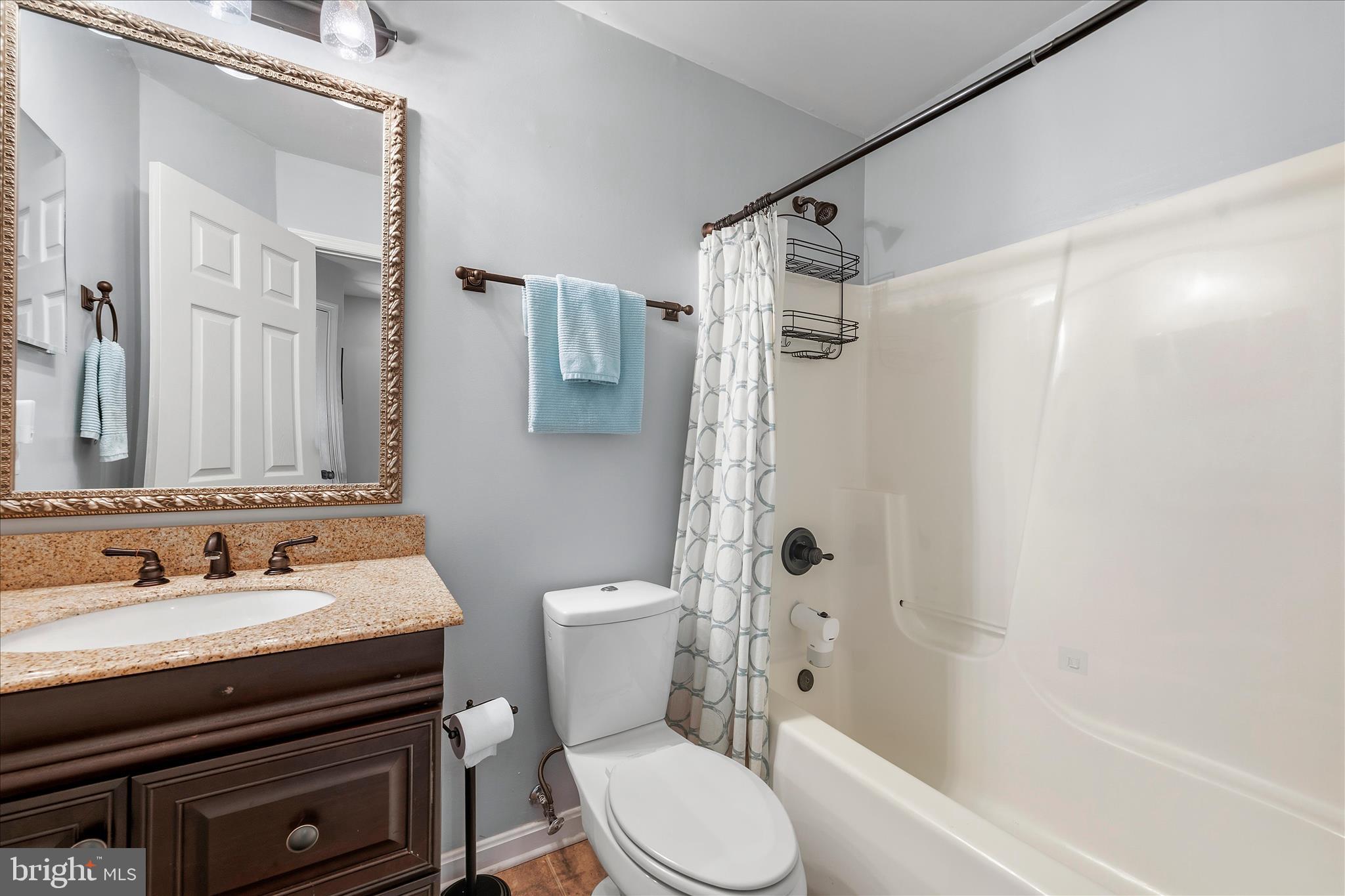 4840 Marsden Place Frederick, MD 21703 - Photo 24 of 46 a bathroom with a sink toilet and shower