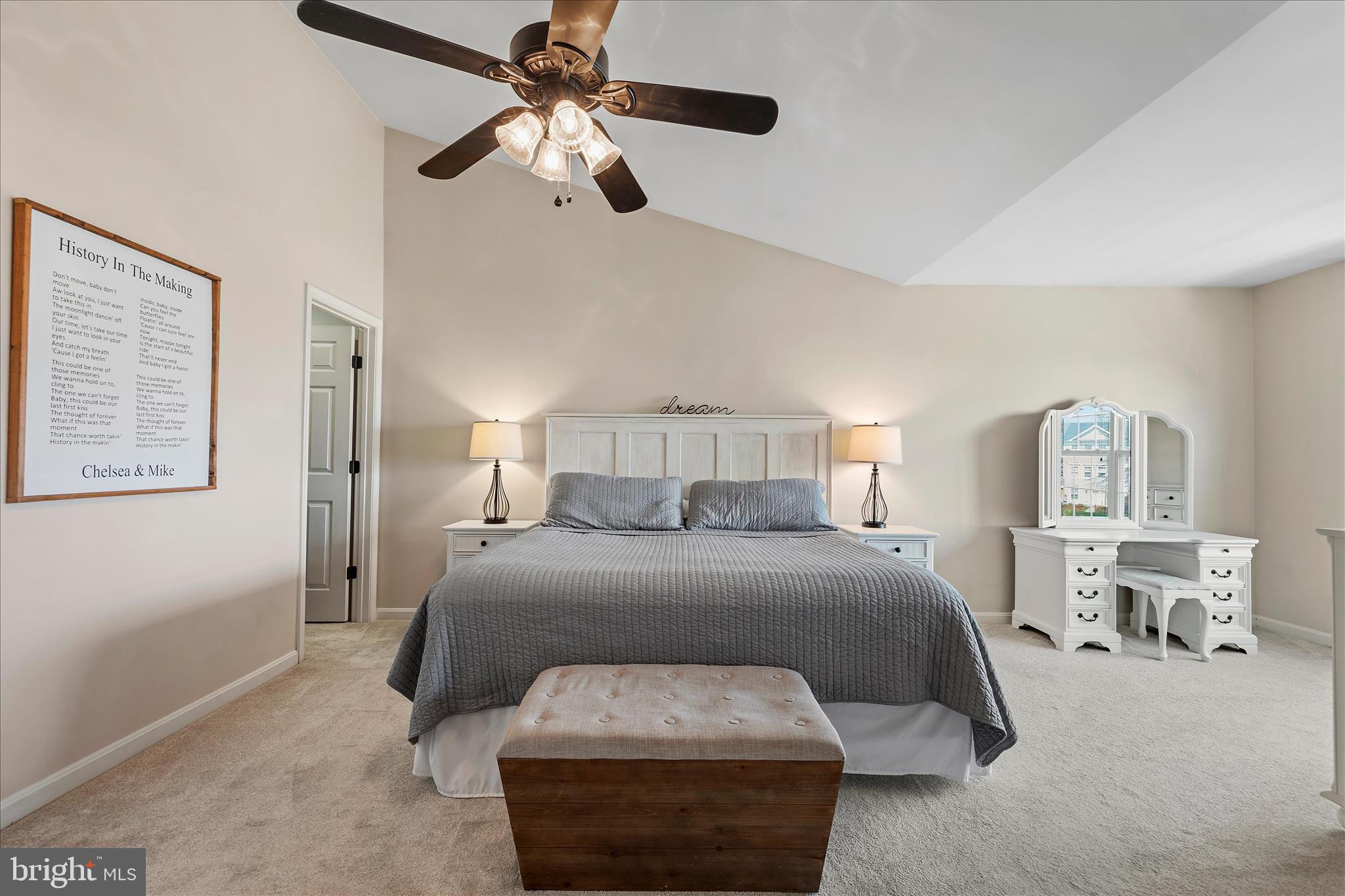 4840 Marsden Place Frederick, MD 21703 - Photo 26 of 46 a bedroom with a bed and a chandelier