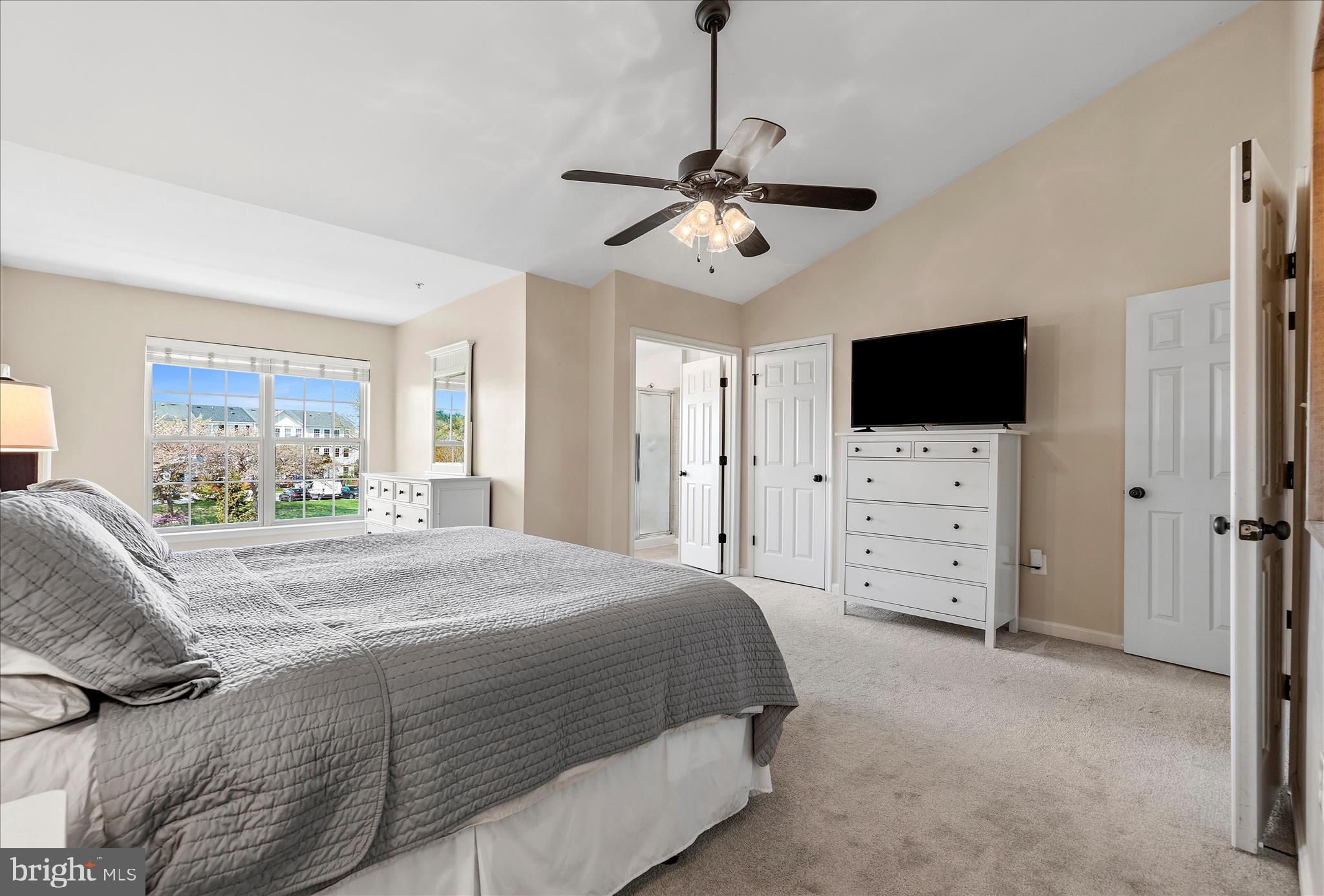 4840 Marsden Place Frederick, MD 21703 - Photo 27 of 46 a bedroom with a bed and a flat screen tv