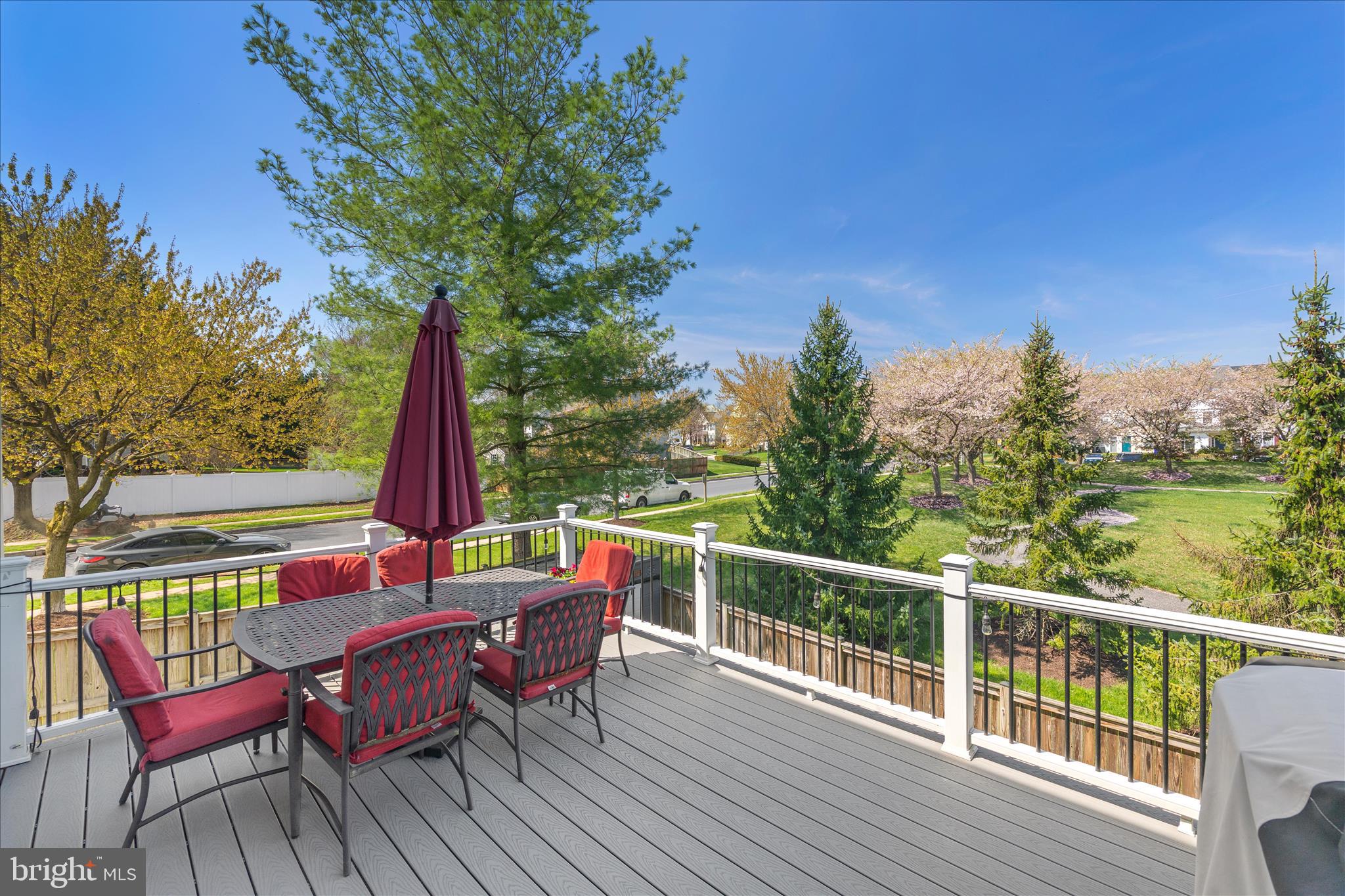 4840 Marsden Place Frederick, MD 21703 - Photo 38 of 46 a view of deck with furniture and trees around