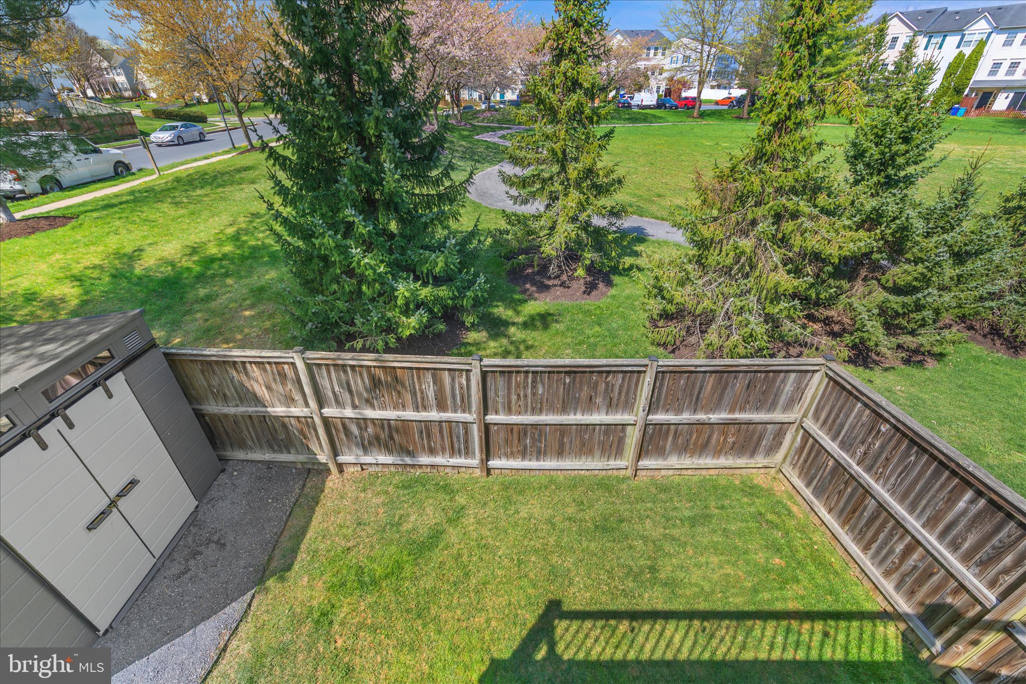 4840 Marsden Place Frederick, MD 21703 - Photo 40 of 46 a view of a yard with a wooden fence