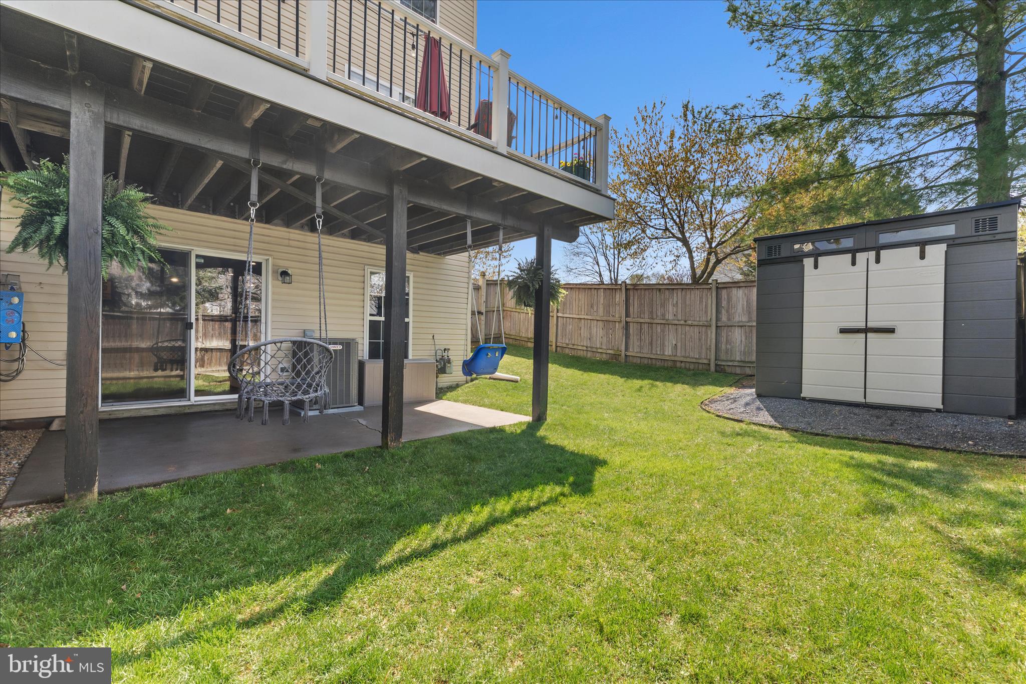 4840 Marsden Place Frederick, MD 21703 - Photo 41 of 46 a view of a backyard with a small cabin and a chair