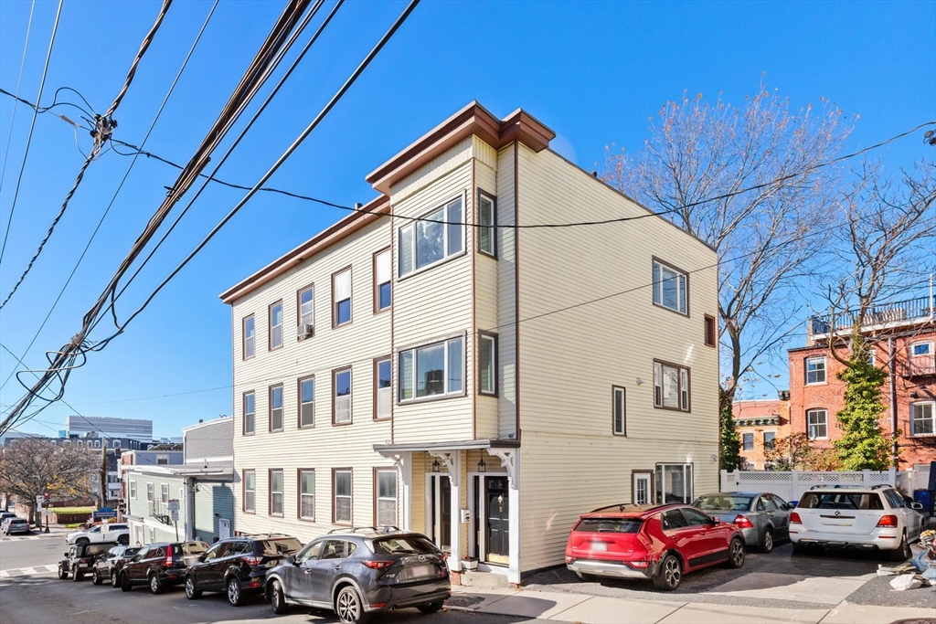 a car parked in front of a building