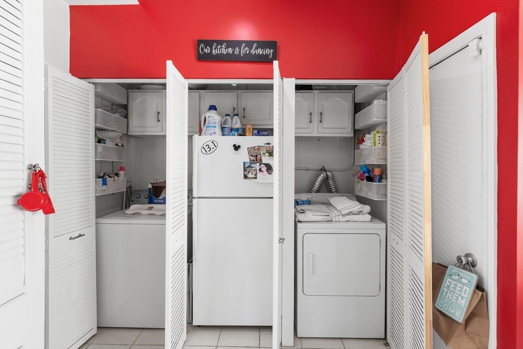 6-8 School Street Boston, MA 02129 - Photo 23 of 27 a utility room with dryer and washer