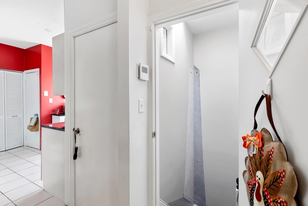 6-8 School Street Boston, MA 02129 - Photo 25 of 27 a bathroom with a shower and a sink