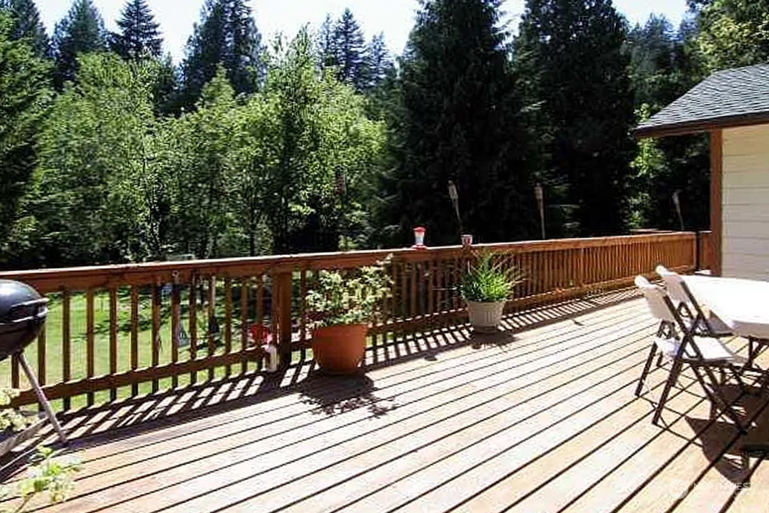 1551 East Loop Road Stevenson, WA 98648 - Photo 11 of 19 a view of balcony with wooden floor and outdoor seating