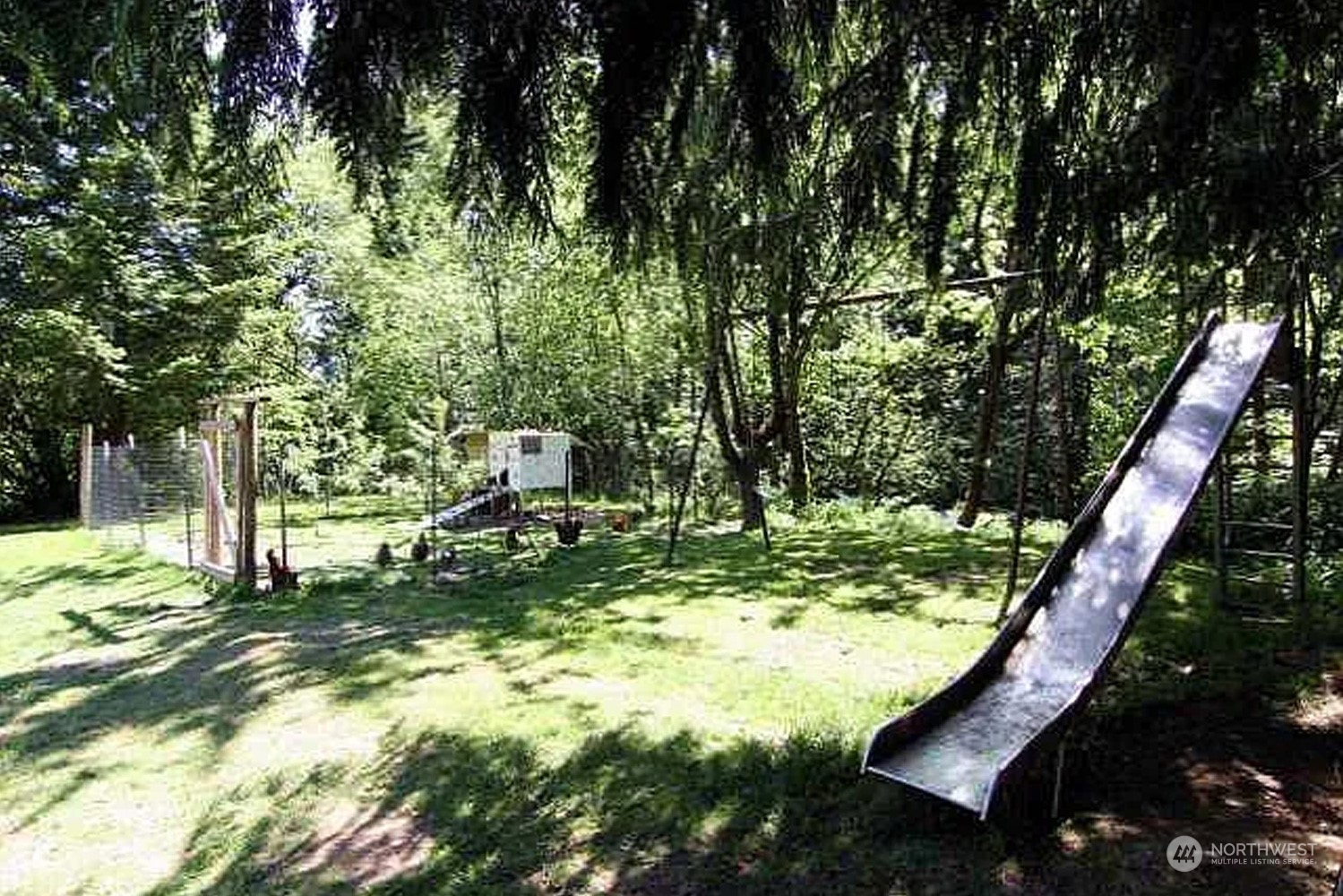 1551 East Loop Road Stevenson, WA 98648 - Photo 12 of 19 a view of a yard with large trees