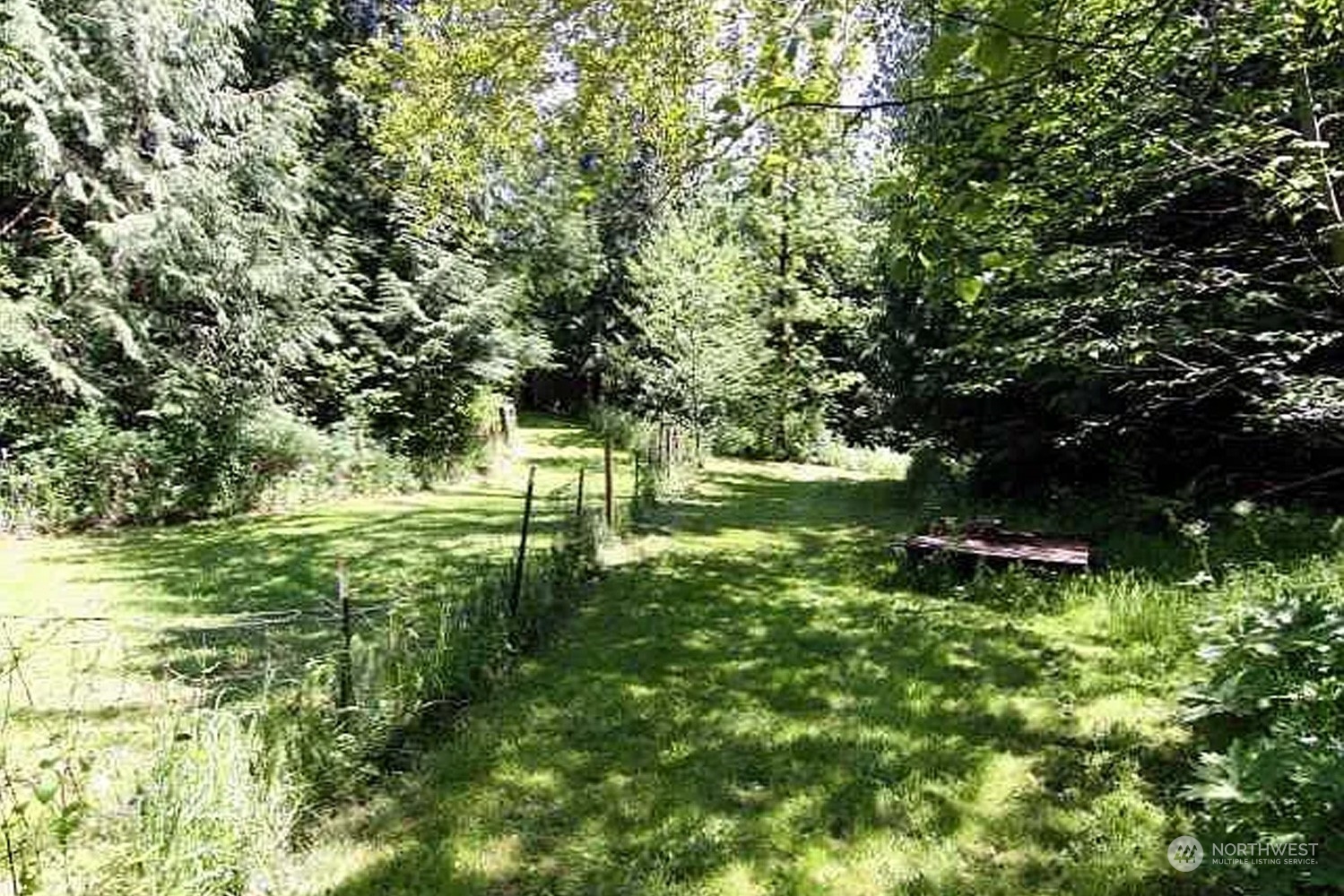 1551 East Loop Road Stevenson, WA 98648 - Photo 13 of 19 a view of a garden with a lake