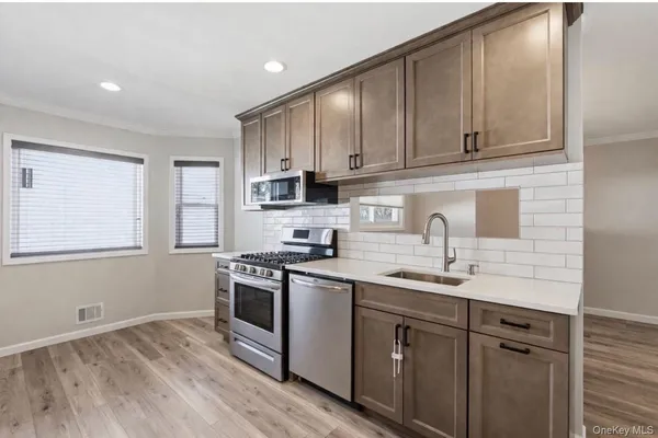 $639,999 | 205 Smithtown Polk Boulevard, Centereach, NY 11720