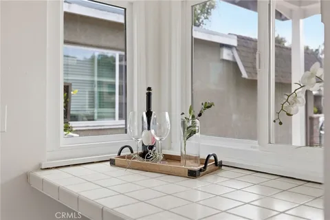 a view of a bathroom with a tub and sink