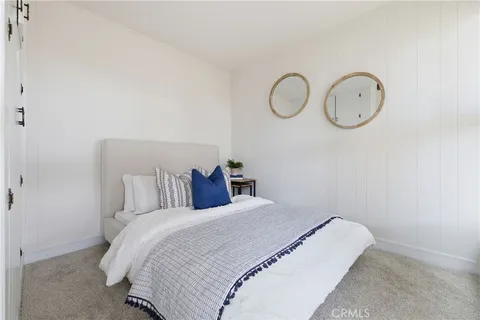 a bed room with a bed and a closet