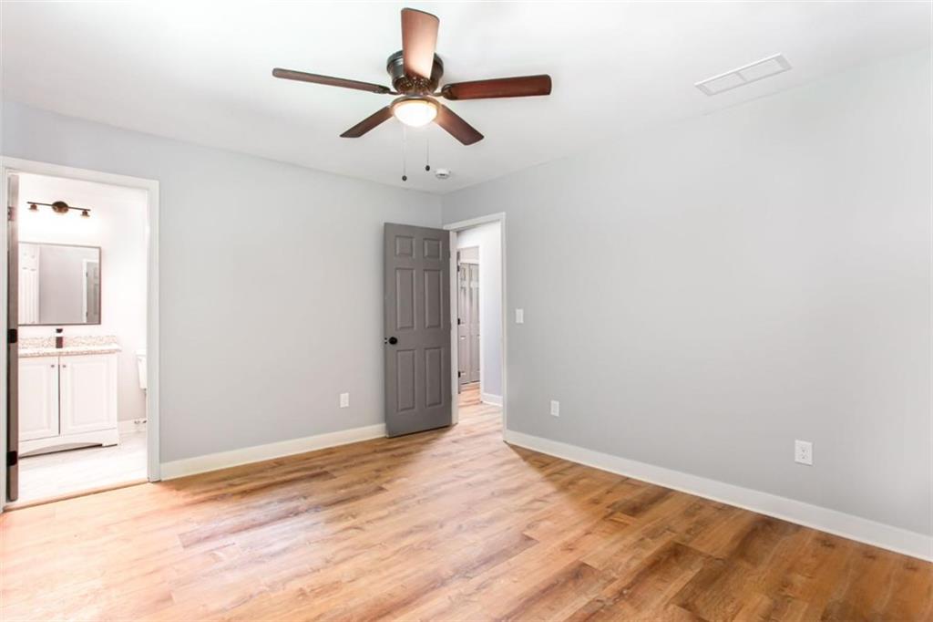 3652 Sweetbriar Circle Lithia Springs, GA 30122 - Photo 19 of 30 wooden floor in an empty room