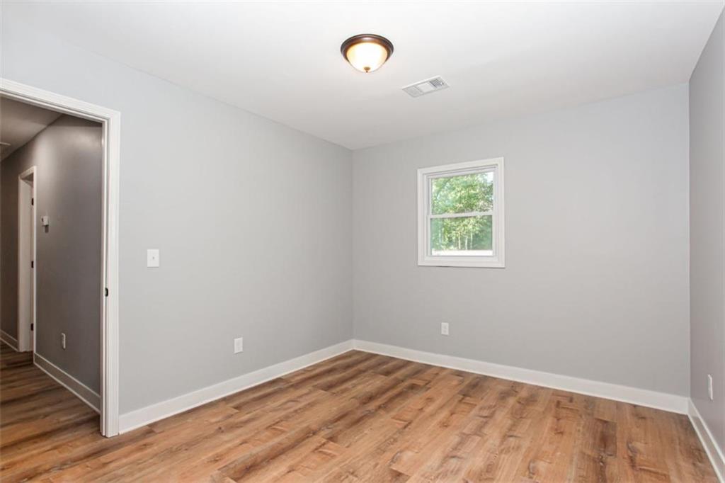 3652 Sweetbriar Circle Lithia Springs, GA 30122 - Photo 27 of 30 an empty room with a window