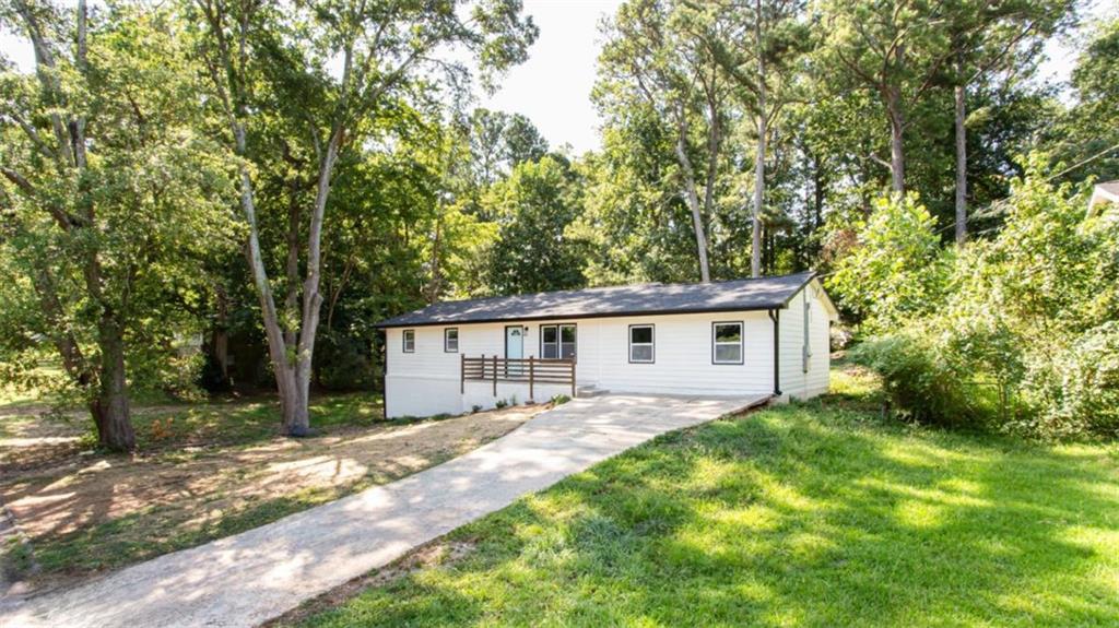 3652 Sweetbriar Circle Lithia Springs, GA 30122 - Photo 3 of 30 front view of a house with a yard