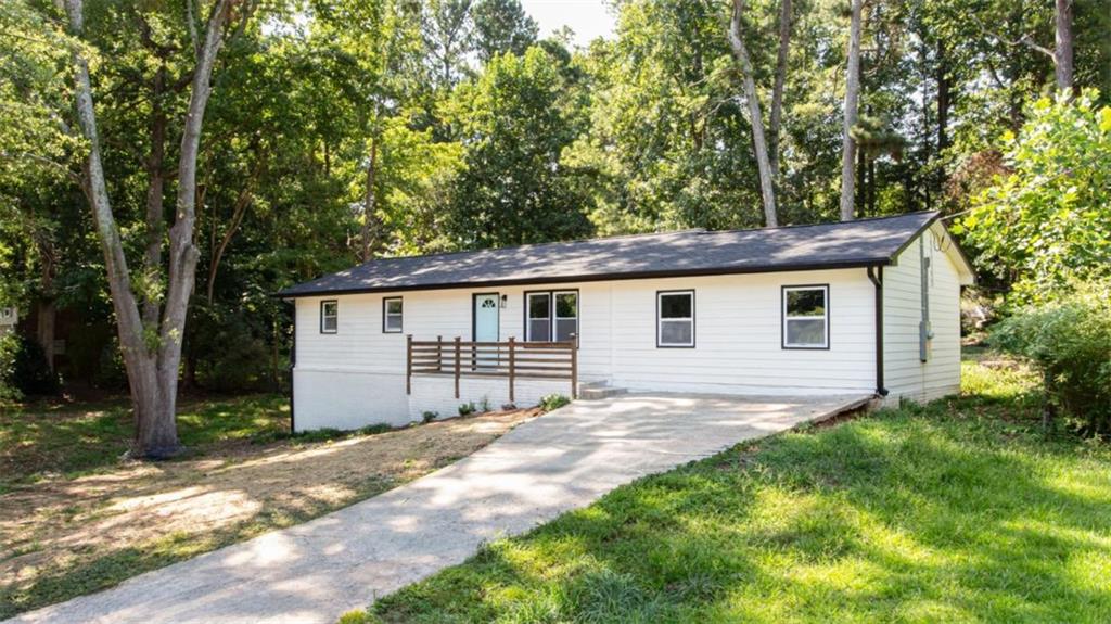 3652 Sweetbriar Circle Lithia Springs, GA 30122 - Photo 4 of 30 a view of a house with a yard