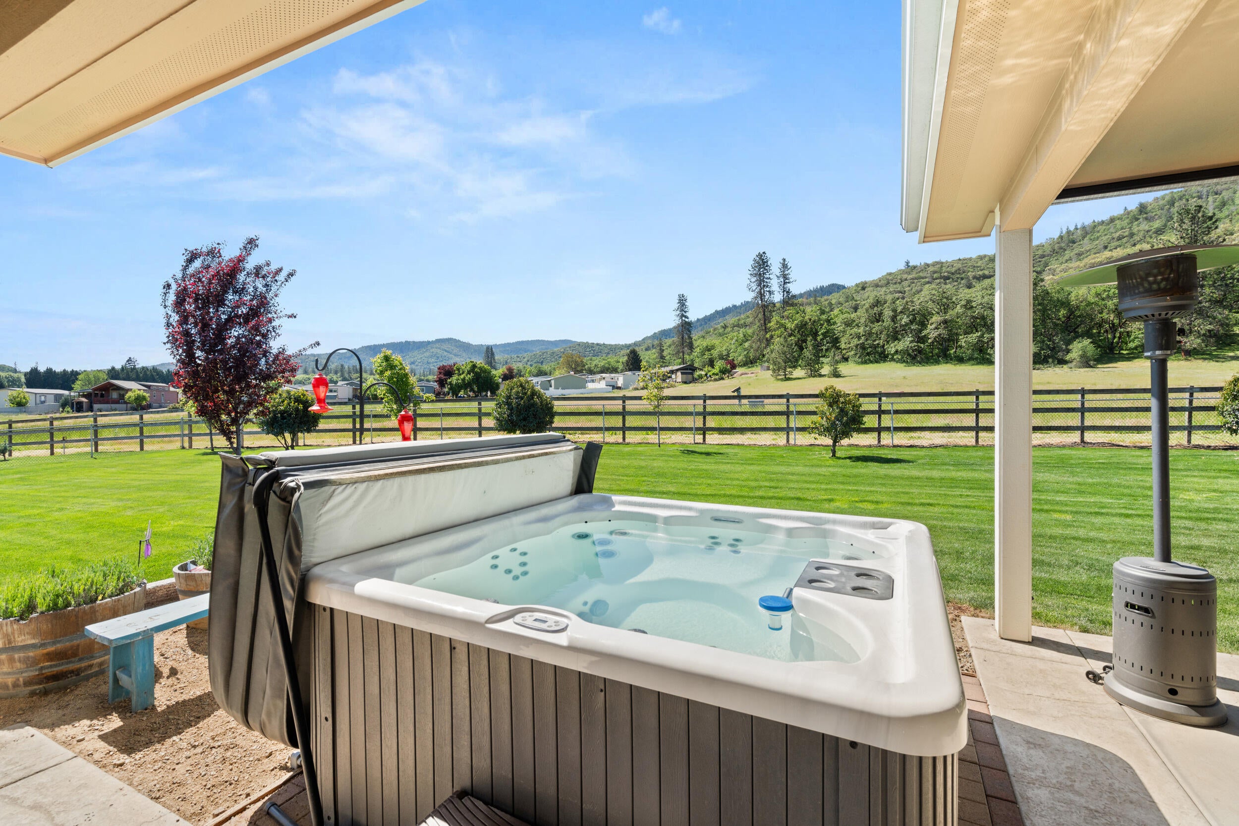 7765 Colonial Way Central Point, OR 97502 - Photo 41 of 50 Hot tub off of primary suite