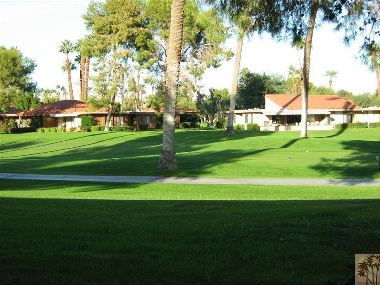 58 Majorca Drive Rancho Mirage, CA 92270 - Photo 21 of 22 a front view of a house with a yard table and chairs