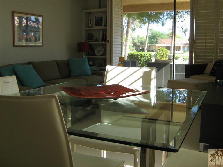 58 Majorca Drive Rancho Mirage, CA 92270 - Photo 7 of 22 a living room with furniture and a floor to ceiling window