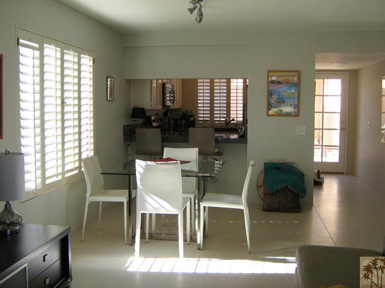 58 Majorca Drive Rancho Mirage, CA 92270 - Photo 8 of 22 a view of a dining room with furniture and wooden floor