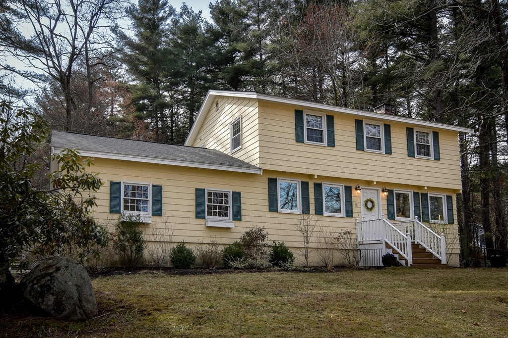 248 Liberty Square Road Boxborough, MA 01719 - Photo 1 of 31 a front view of a house with a yard