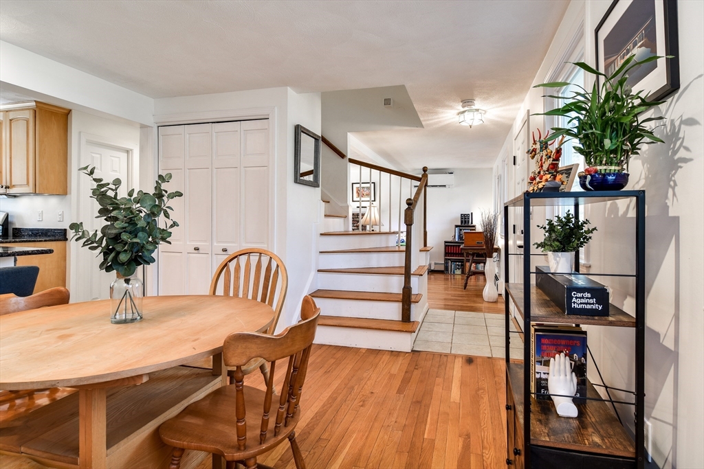 248 Liberty Square Road Boxborough, MA 01719 - Photo 11 of 31 a dining room with furniture entryway and wooden floor