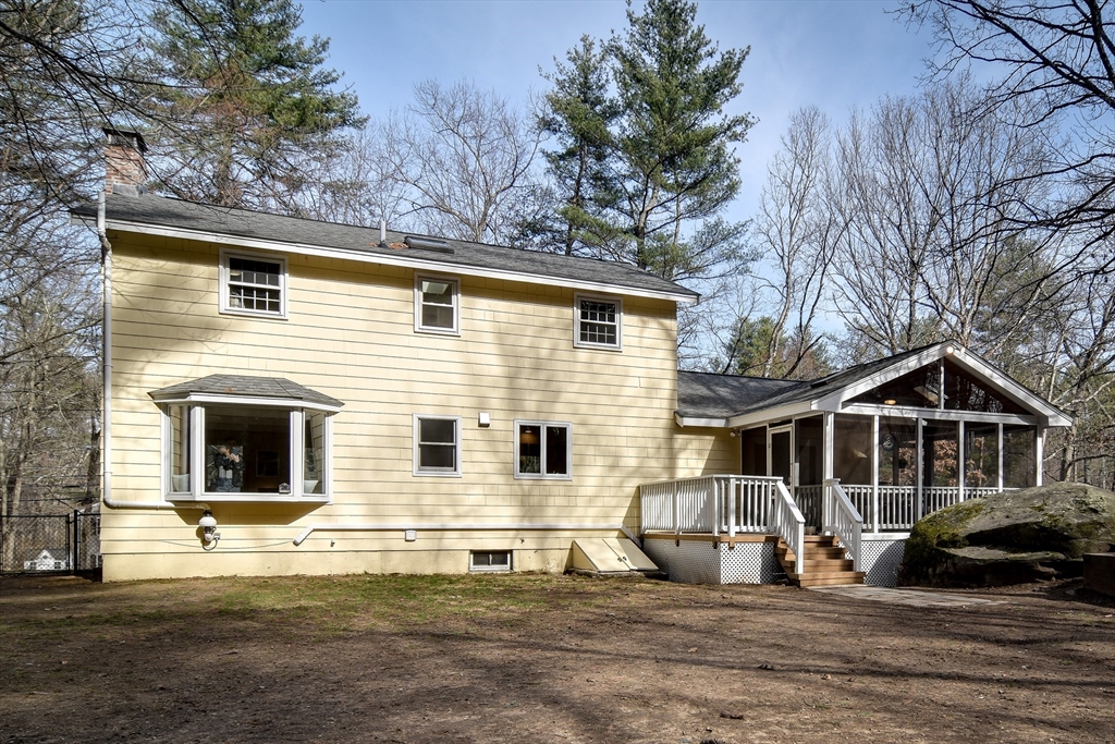 248 Liberty Square Road Boxborough, MA 01719 - Photo 30 of 31 a view of a house with a patio
