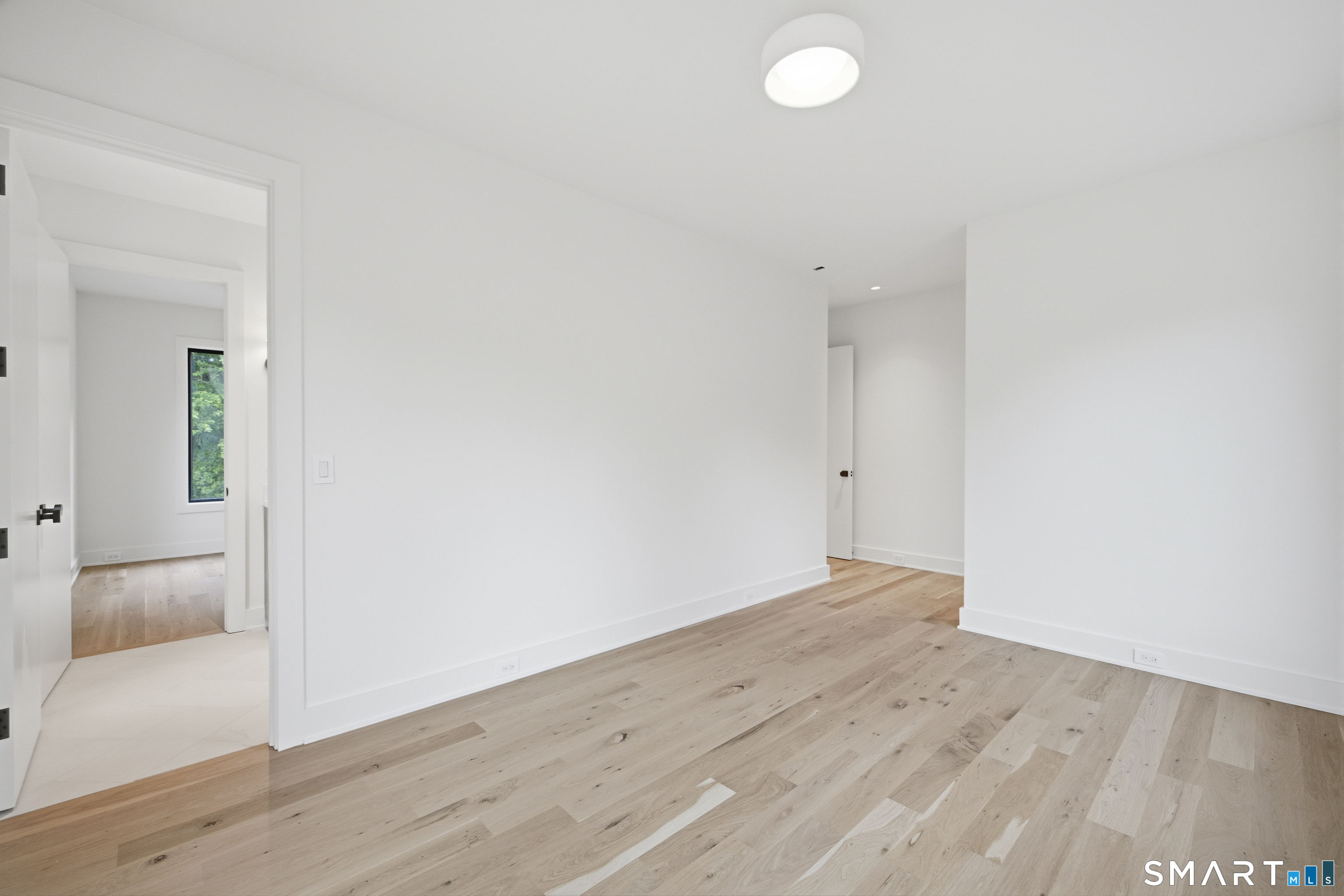 2 Windy Hill Road Westport, CT 06880 - Photo 31 of 40 wooden floor in an empty room
