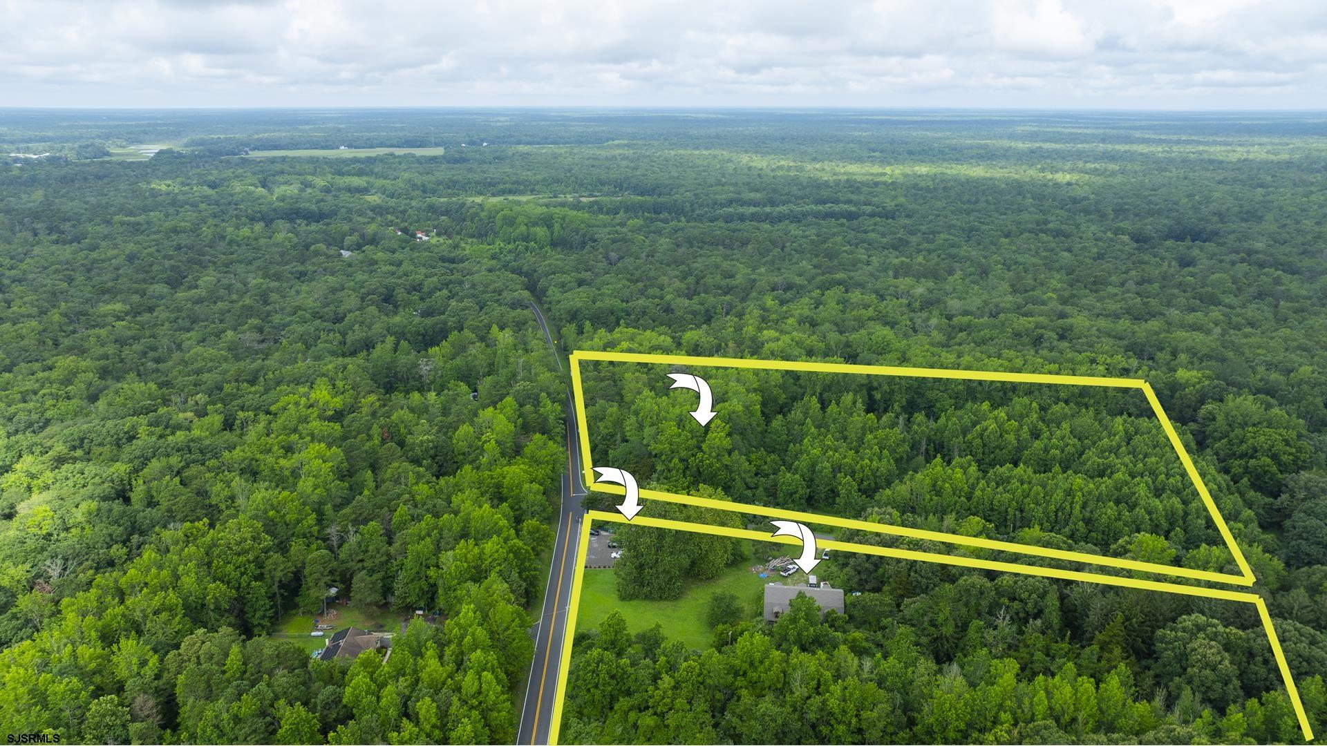 126 Buck Hill Road Corbin City, NJ 08270 - Photo 8 of 10 a view of outdoor space with deck and yard