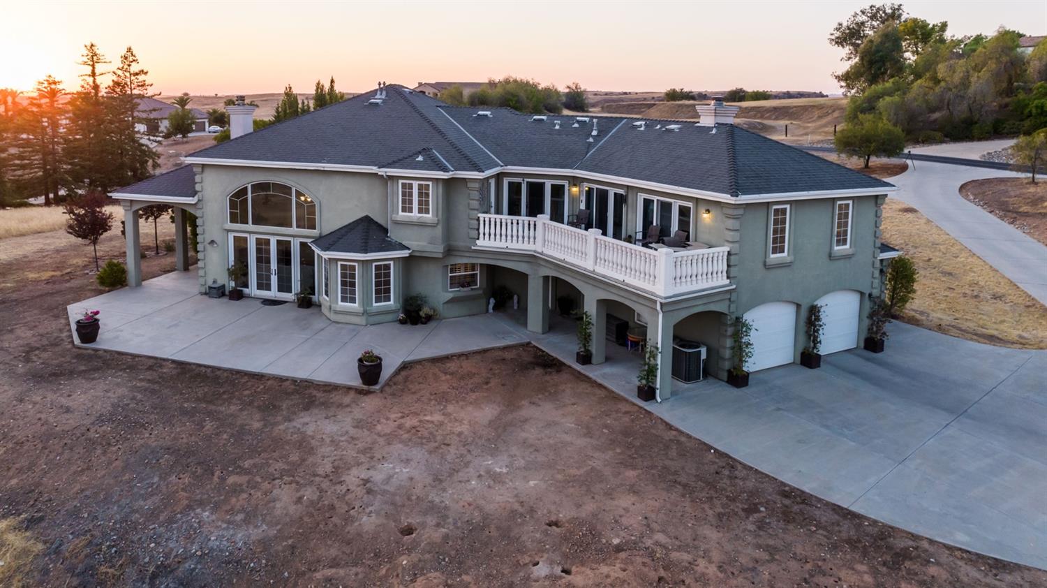14374 Killarney Drive Madera, CA 93636 - Photo 13 of 56 a view of a house with pool and chairs