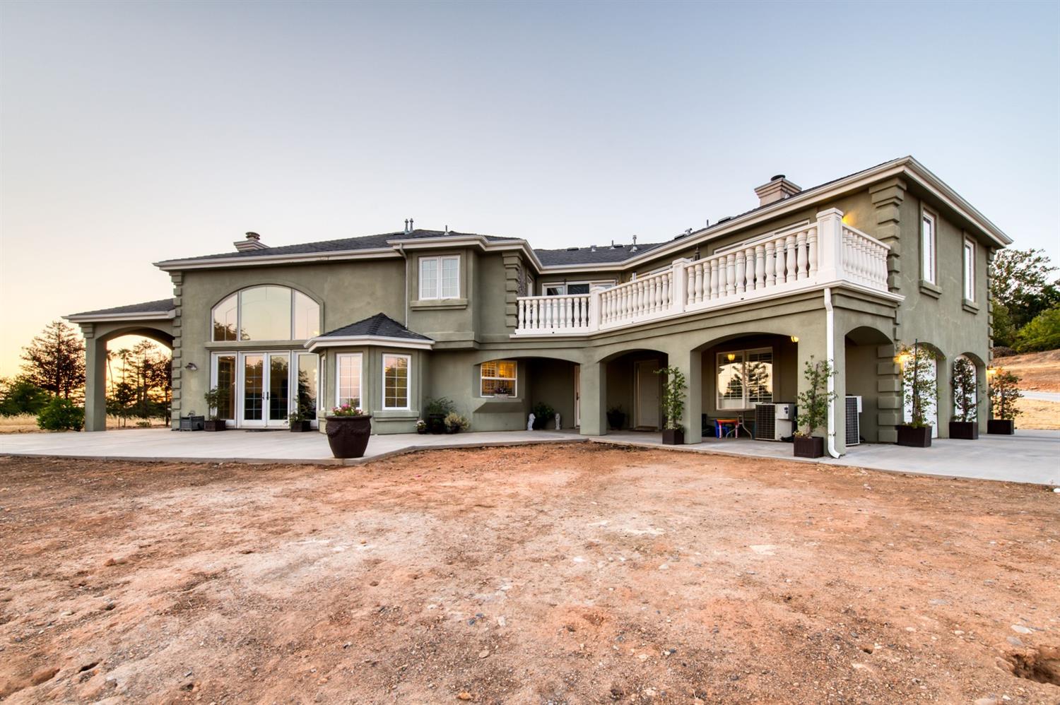 14374 Killarney Drive Madera, CA 93636 - Photo 16 of 56 a view of a house with a large space in front of it