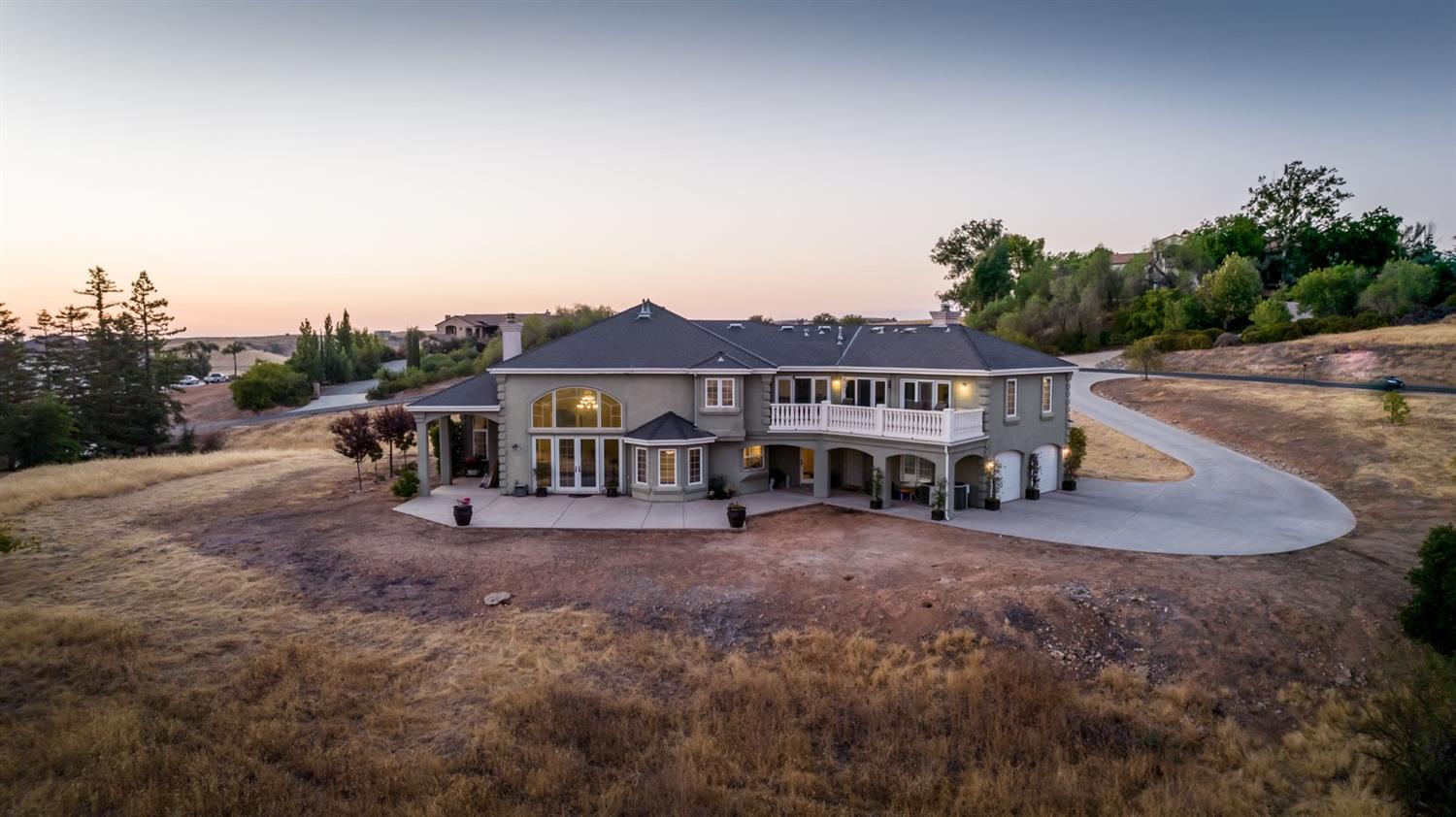 14374 Killarney Drive Madera, CA 93636 - Photo 19 of 56 a view of a house with a yard and sitting area