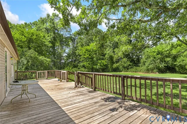 a balcony with trees in front of it