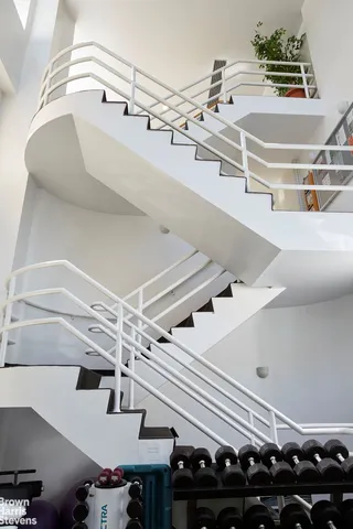 a view of a living room and wooden floor