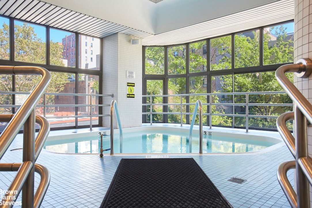 2000 Broadway, Unit 10C Manhattan, NY 10023 - Photo 11 of 16 a view of a living room and wooden floor
