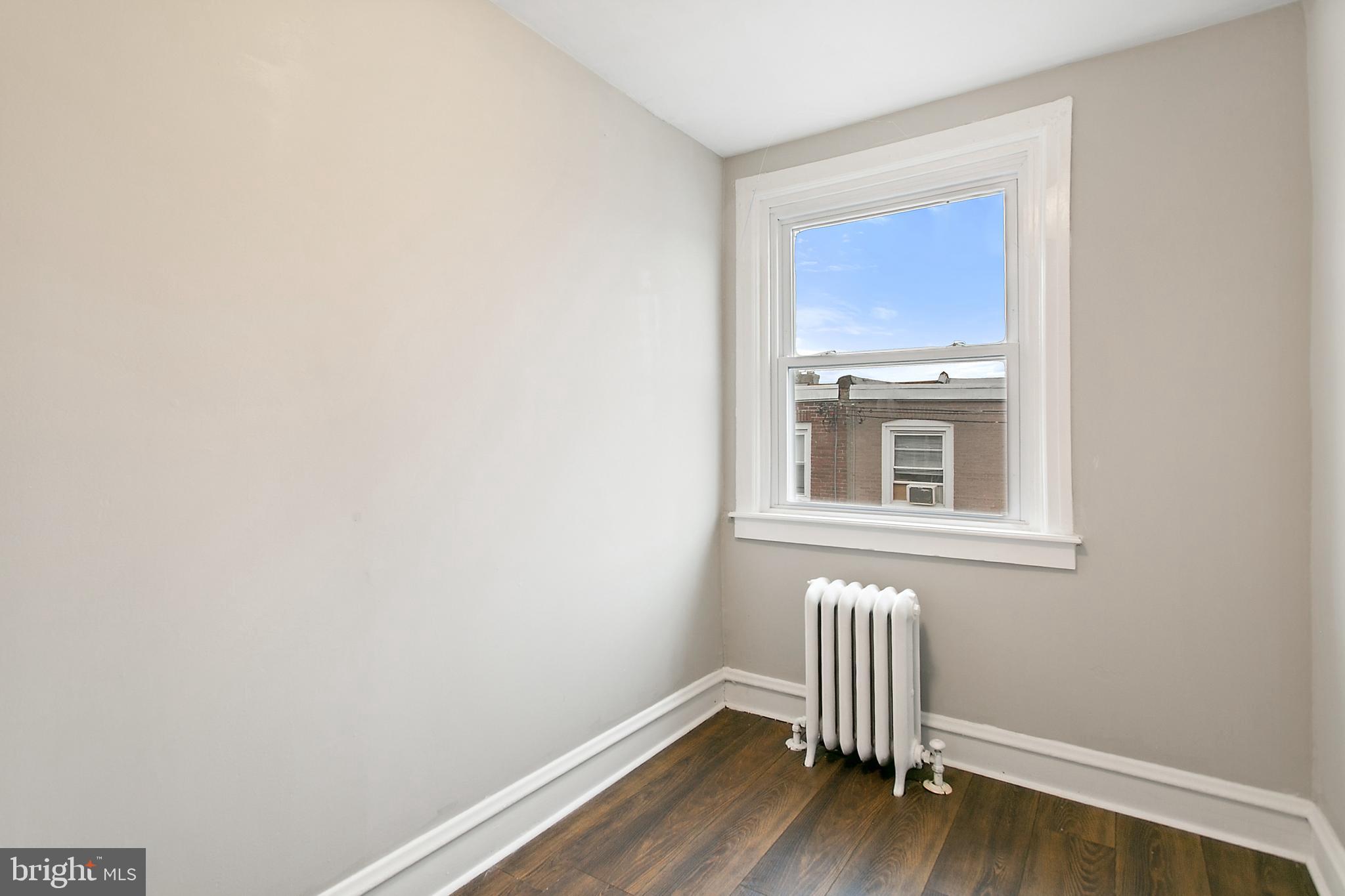 7158 Radbourne Road Upper Darby, PA 19082 - Photo 13 of 15 a view of wooden floor in a room