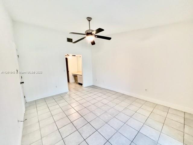 705 Southeast 22nd Lane Homestead, FL 33033 - Photo 13 of 43 a view of a room with an empty space
