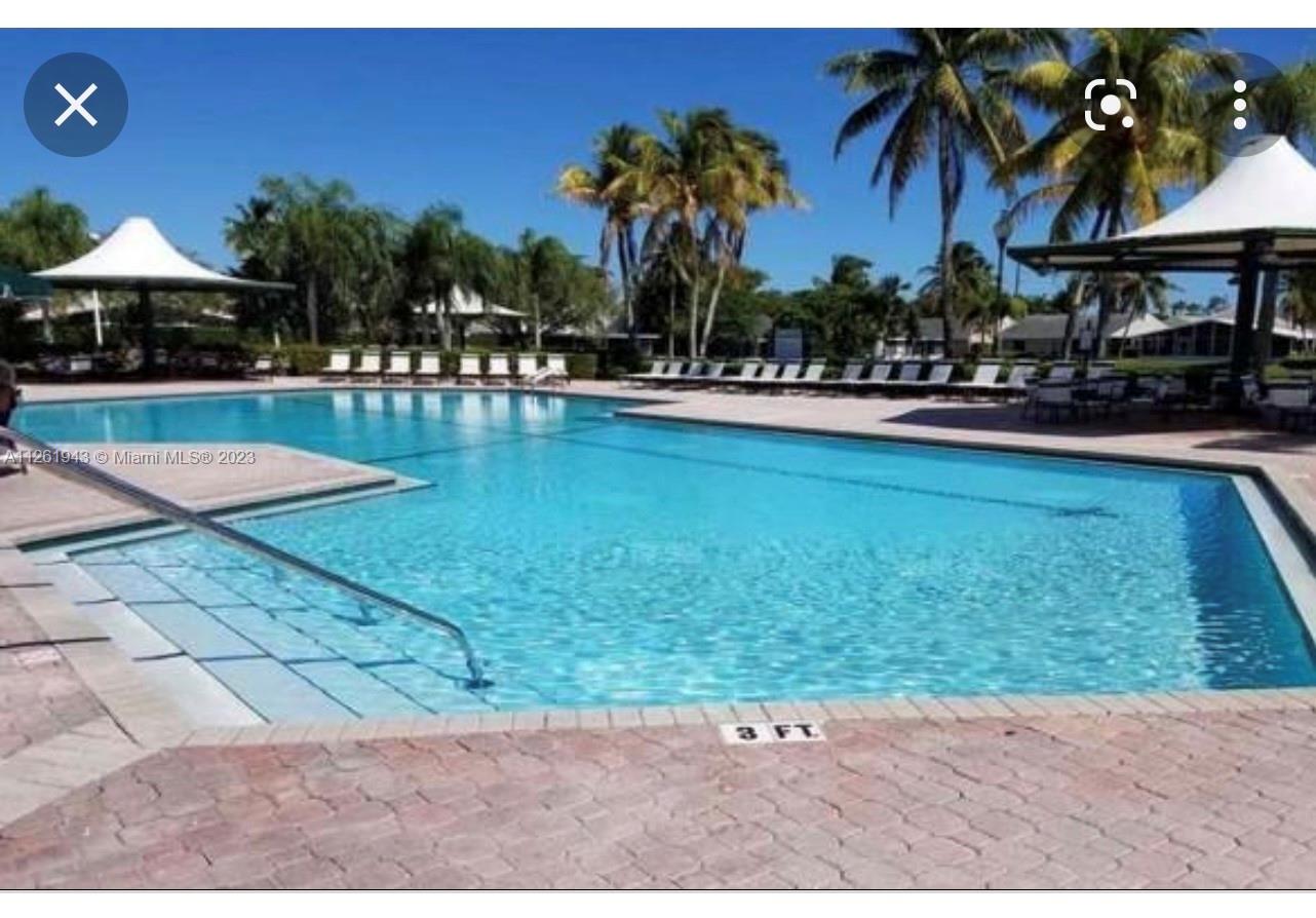 705 Southeast 22nd Lane Homestead, FL 33033 - Photo 32 of 43 a view of swimming pool with outdoor seating and yard