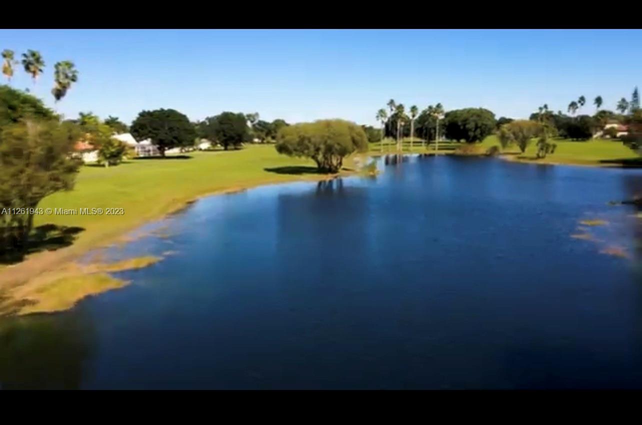 705 Southeast 22nd Lane Homestead, FL 33033 - Photo 41 of 43 a view of a lake