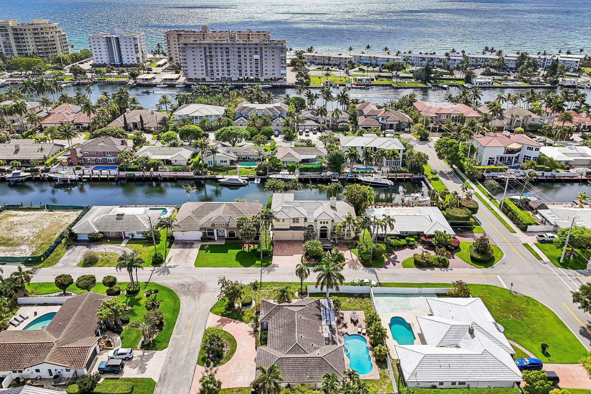 2940 Northeast 39th Court Lighthouse Point, FL 33064 - Photo 40 of 42 an aerial view of a house with a lake view