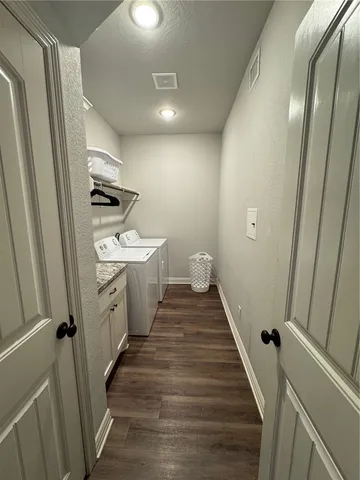 a bathroom with sink a toilet and a mirror