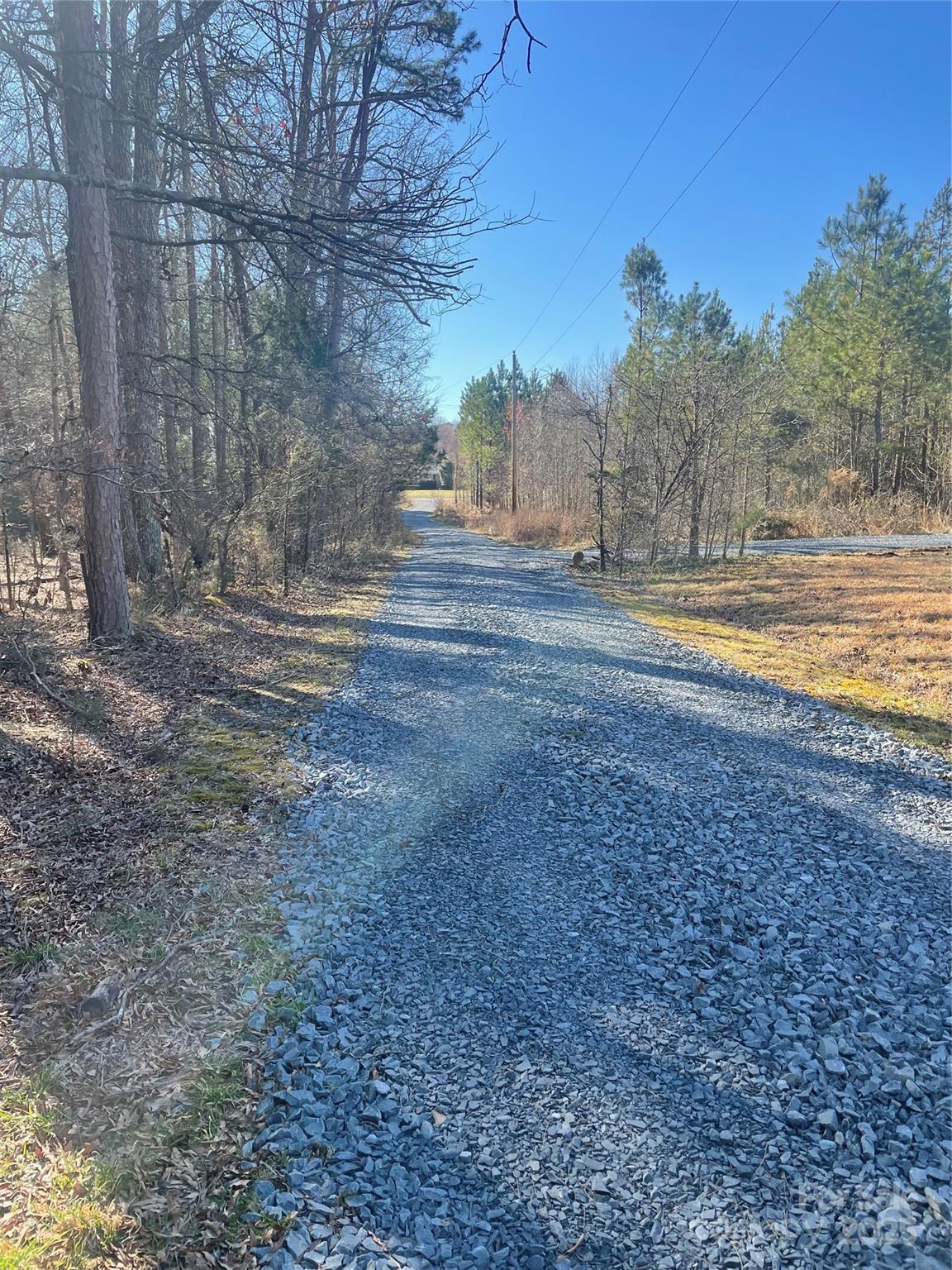 37254 Barnhardt Road Albemarle, NC 28001 - Photo 5 of 10 a view of road and trees