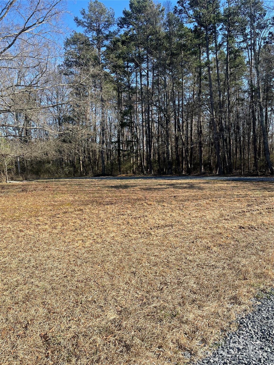 37254 Barnhardt Road Albemarle, NC 28001 - Photo 9 of 10 a view of a yard with a bench