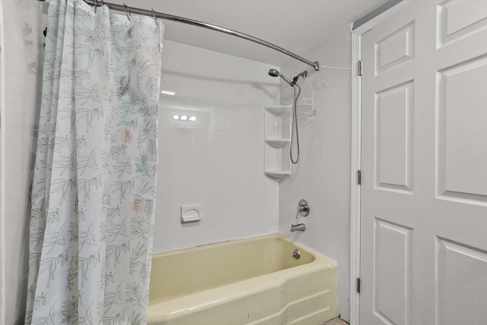 4820 West Haddon Avenue Chicago, IL 60651 - Photo 16 of 27 a bathroom with a shower and a bath tub