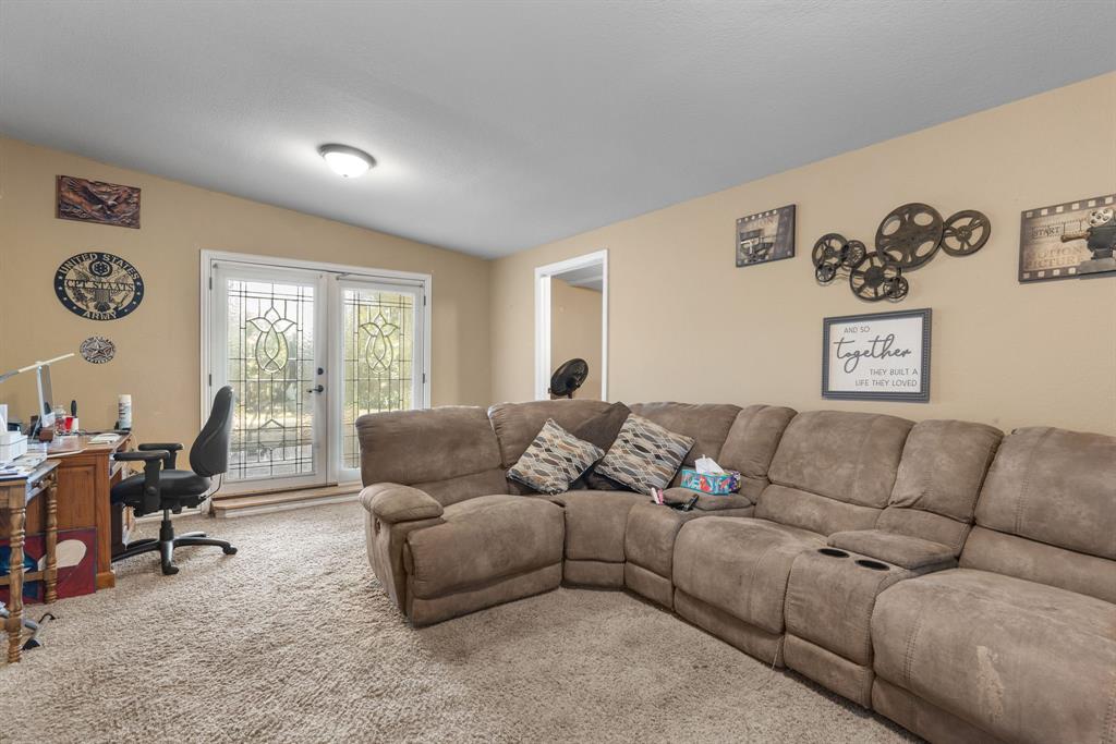4504 Jennings Avenue Wichita Falls, TX 76310 - Photo 14 of 26 a living room with furniture and a large window