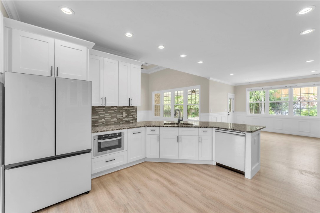 1015 Winmar Drive Anderson, SC 29621 - Photo 18 of 49 This bright kitchen features ample cabinetry, modern appliances, and a beautiful view of the outdoors.