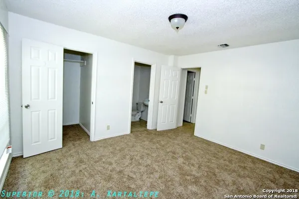 an empty room with closet